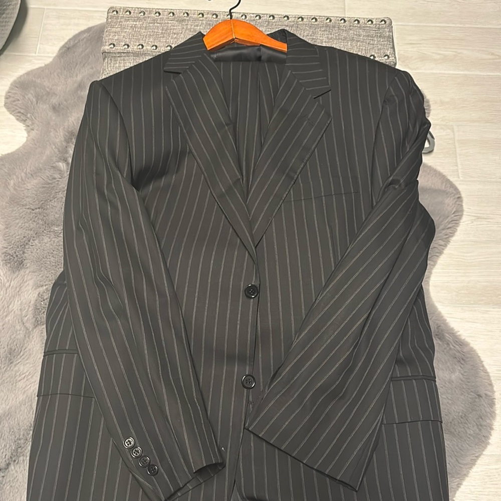 Canali mens 54R 7 which in 44R. Black suite stripe.